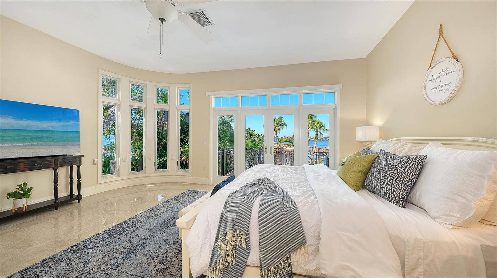2115 LYCHEE LANE, Nokomis, FL 34275 first floor primary bedroom with balcony and stunning views