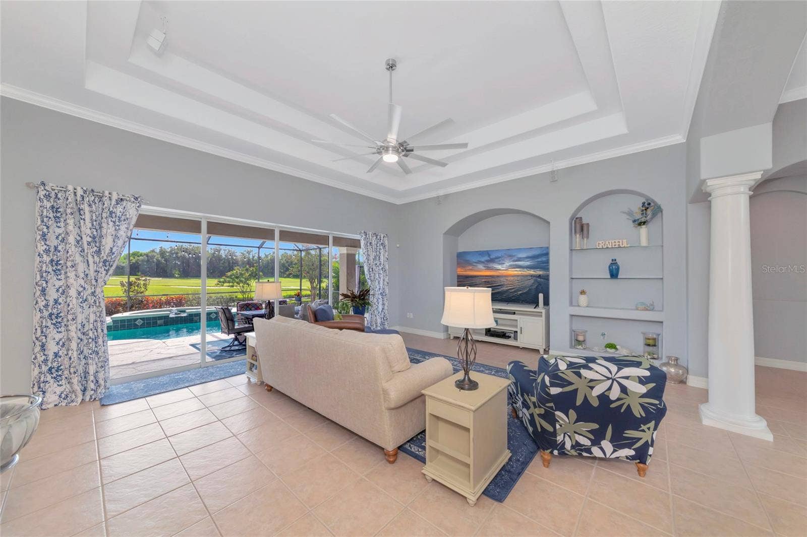 817 MARITIME COURT, Bradenton, FL 34212 Large great room with double tray ceilings tile floors