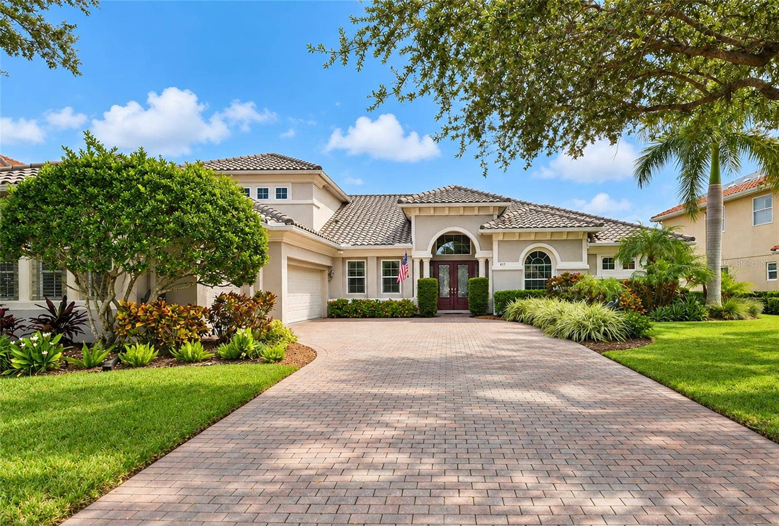 817 MARITIME COURT, Bradenton, FL 34212 Beautiful curb appeal, new roof, gutters and a long shady brick paver driveway