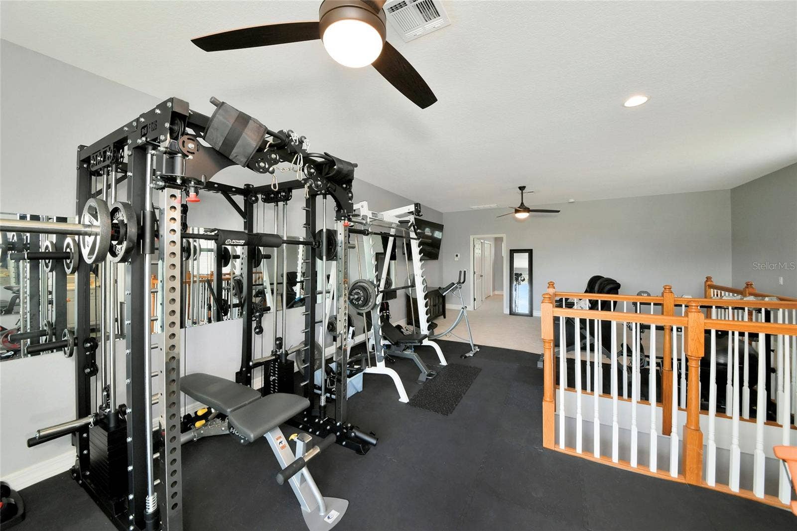 817 MARITIME COURT, Bradenton, FL 34212 upstaris bonus room gym matting can be removed. plenty of space for a pool table, or home theater.