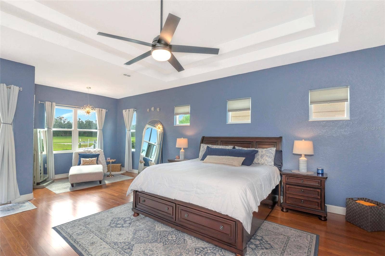 817 MARITIME COURT, Bradenton, FL 34212 double tray ceiling, large primary bedroom with a sitting area, and plenty of natural light.