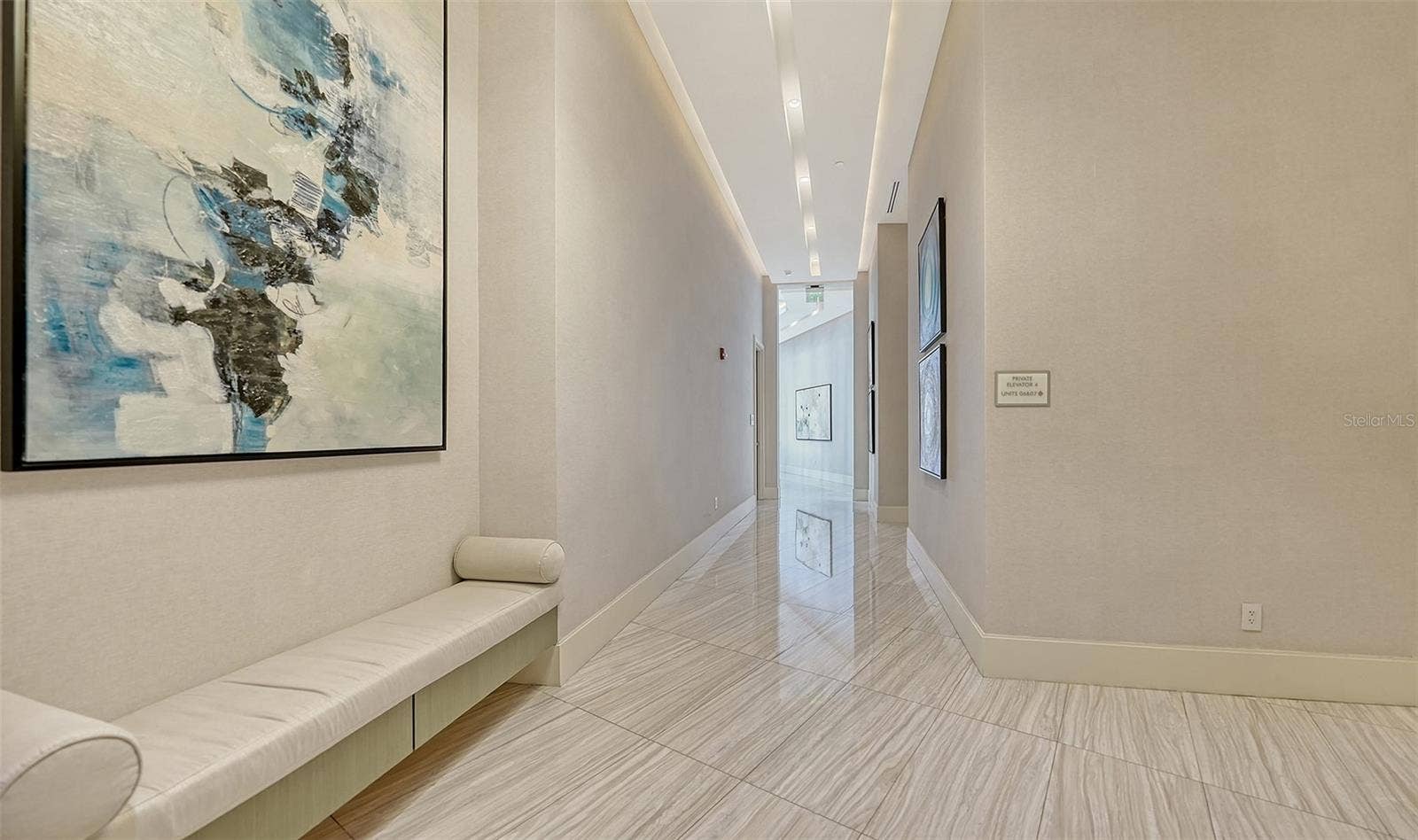 1155 N GULFSTREAM AVENUE, #207, Sarasota, FL 34236 Elegant lobby-level living offers refined comfort, inviting gathering spaces, and effortless everyday convenience.
