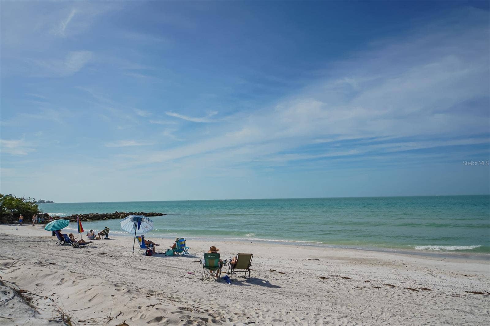 1155 N GULFSTREAM AVENUE, #207, Sarasota, FL 34236 Settle into your beach chair on the pristine white sands of Lido Beach and enjoy the serenity.