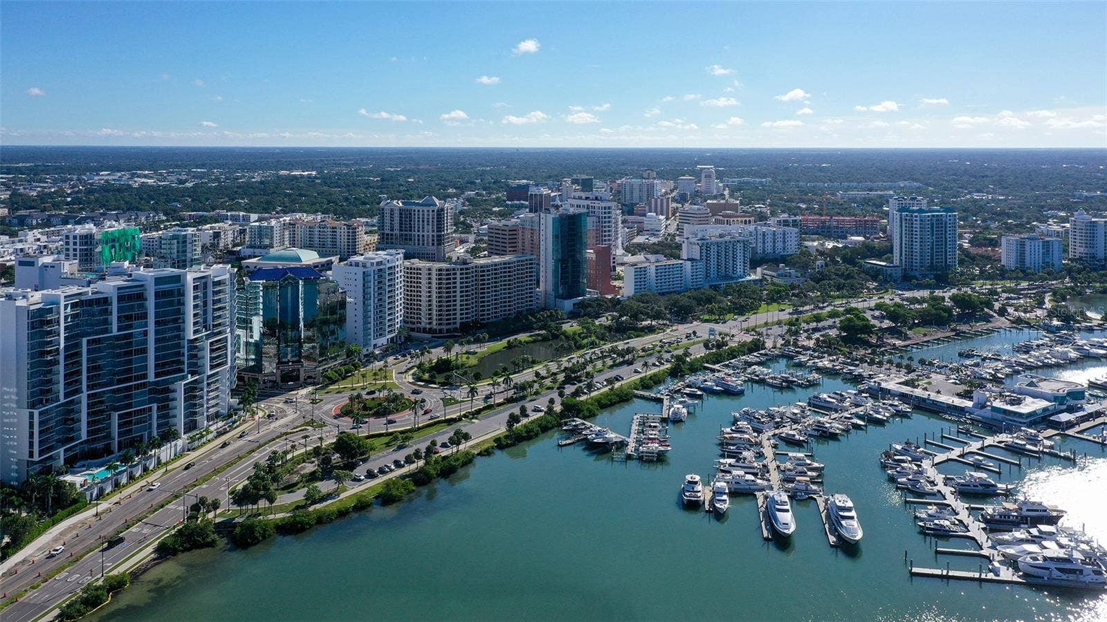 1155 N GULFSTREAM AVENUE, #207, Sarasota, FL 34236 Aerial views capture The VUEs striking waterfront presence against Sarasotas vibrant downtown skyline.
