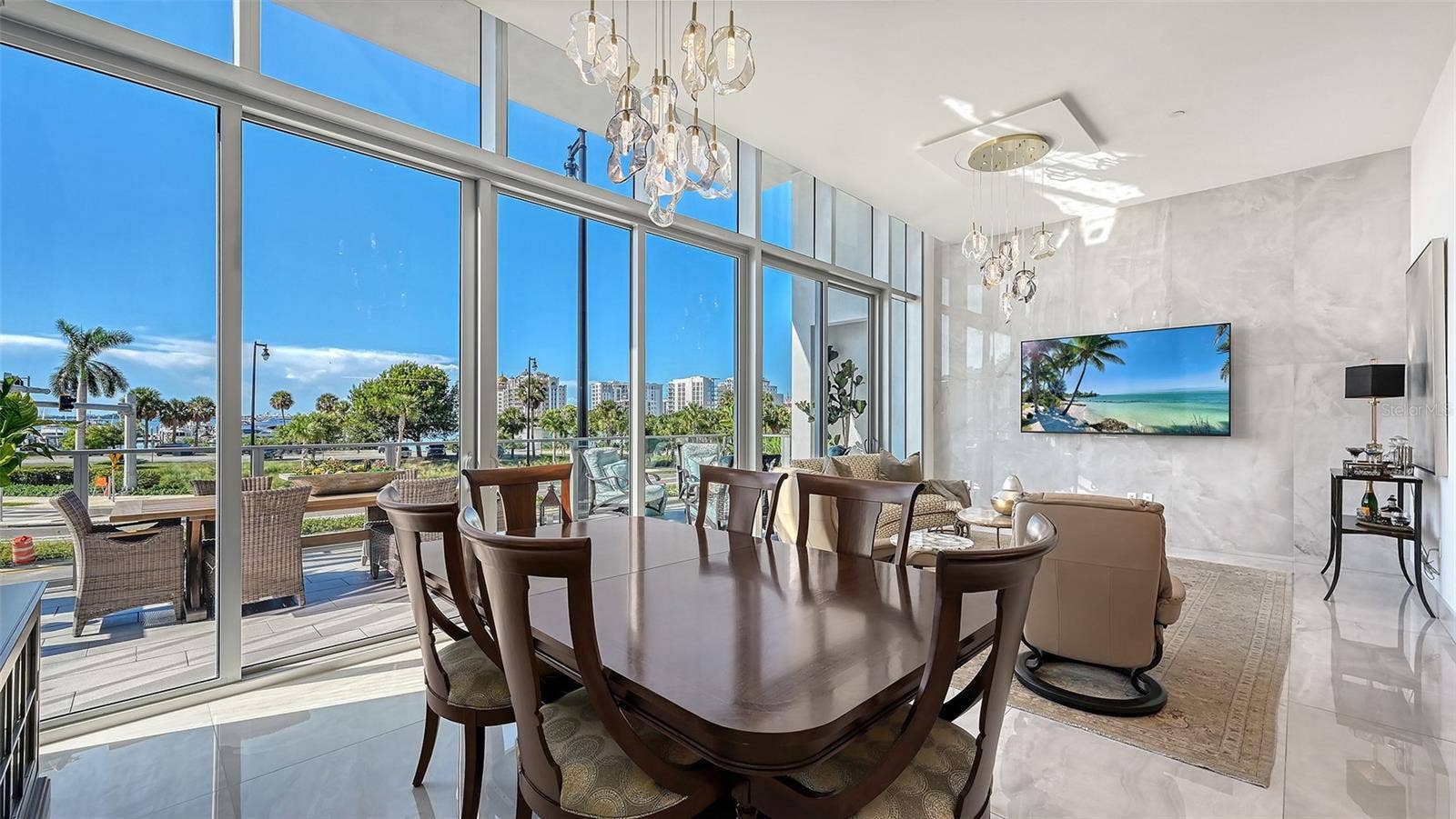 1155 N GULFSTREAM AVENUE, #207, Sarasota, FL 34236 Ideal for entertaining, the spacious kitchen, dining, and living areas flow seamlessly together in an elegant, open-concept design.
