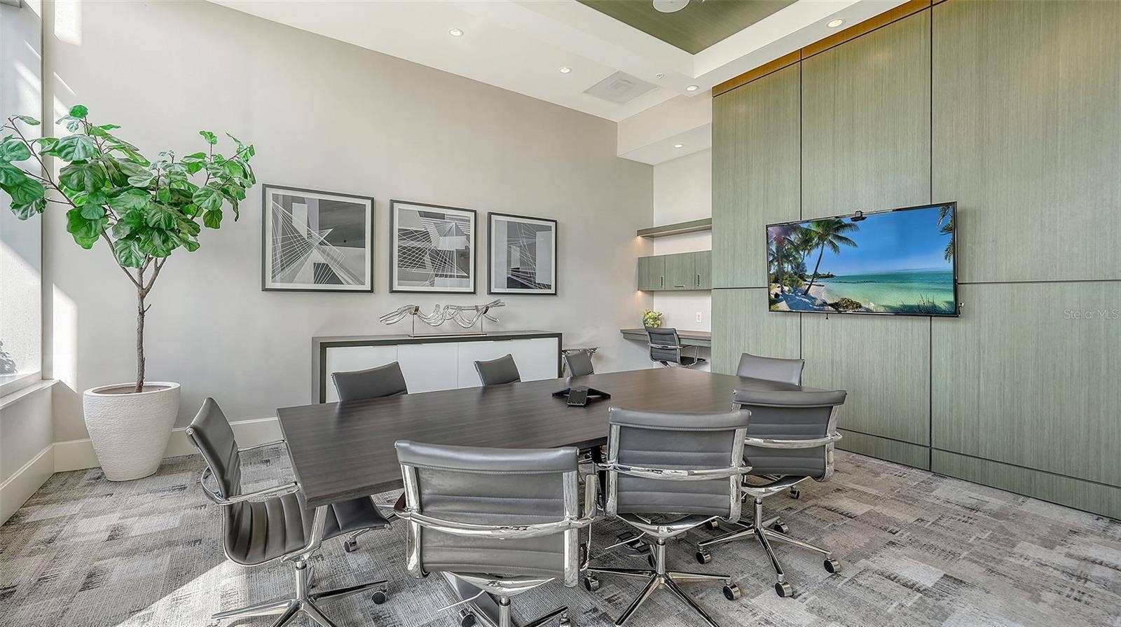 1155 N GULFSTREAM AVENUE, #207, Sarasota, FL 34236 A well-appointed conference room with ample seating, ideal for important meetings, collaboration, and productive gatherings.