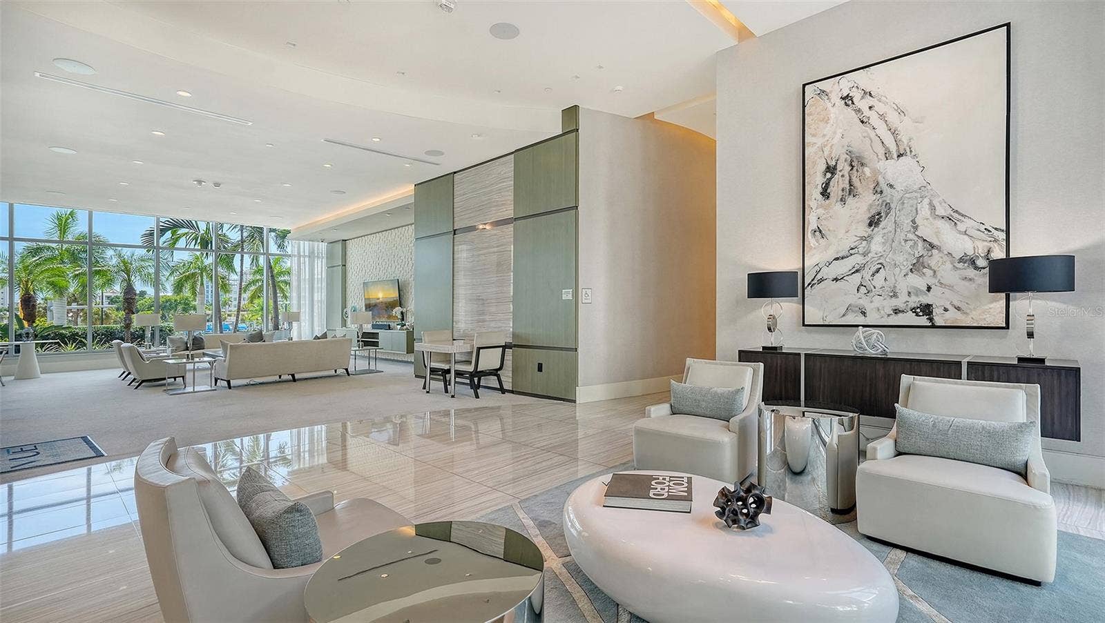 1155 N GULFSTREAM AVENUE, #207, Sarasota, FL 34236 Multiple elegant lobby seating areas provide inviting spaces to welcome guests, socialize, and gather in sophisticated comfort.