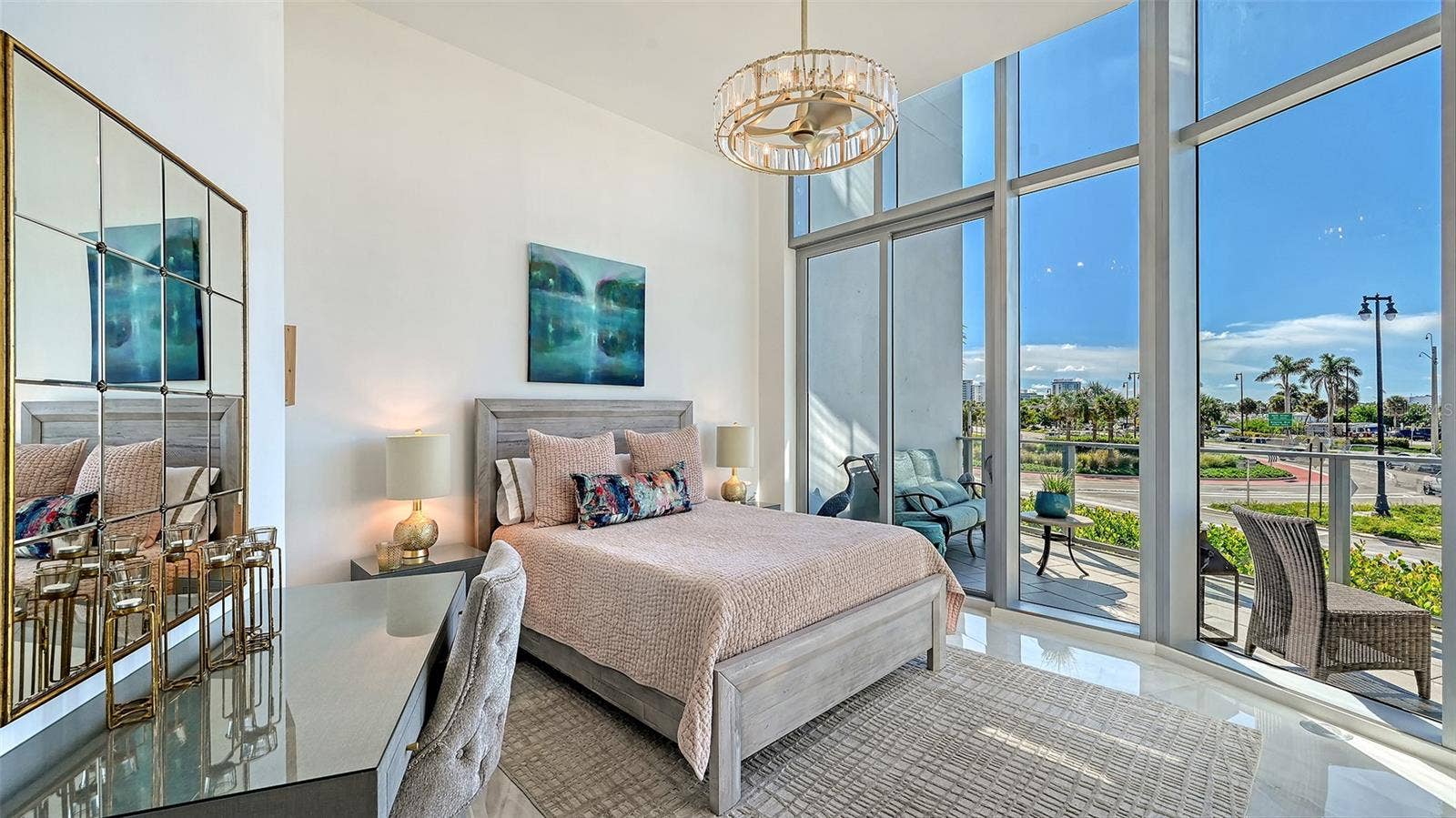 1155 N GULFSTREAM AVENUE, #207, Sarasota, FL 34236 A bright, serene primary suite filled with natural light, offering an elegant retreat with sophisticated finishes and a calming, airy ambiance.