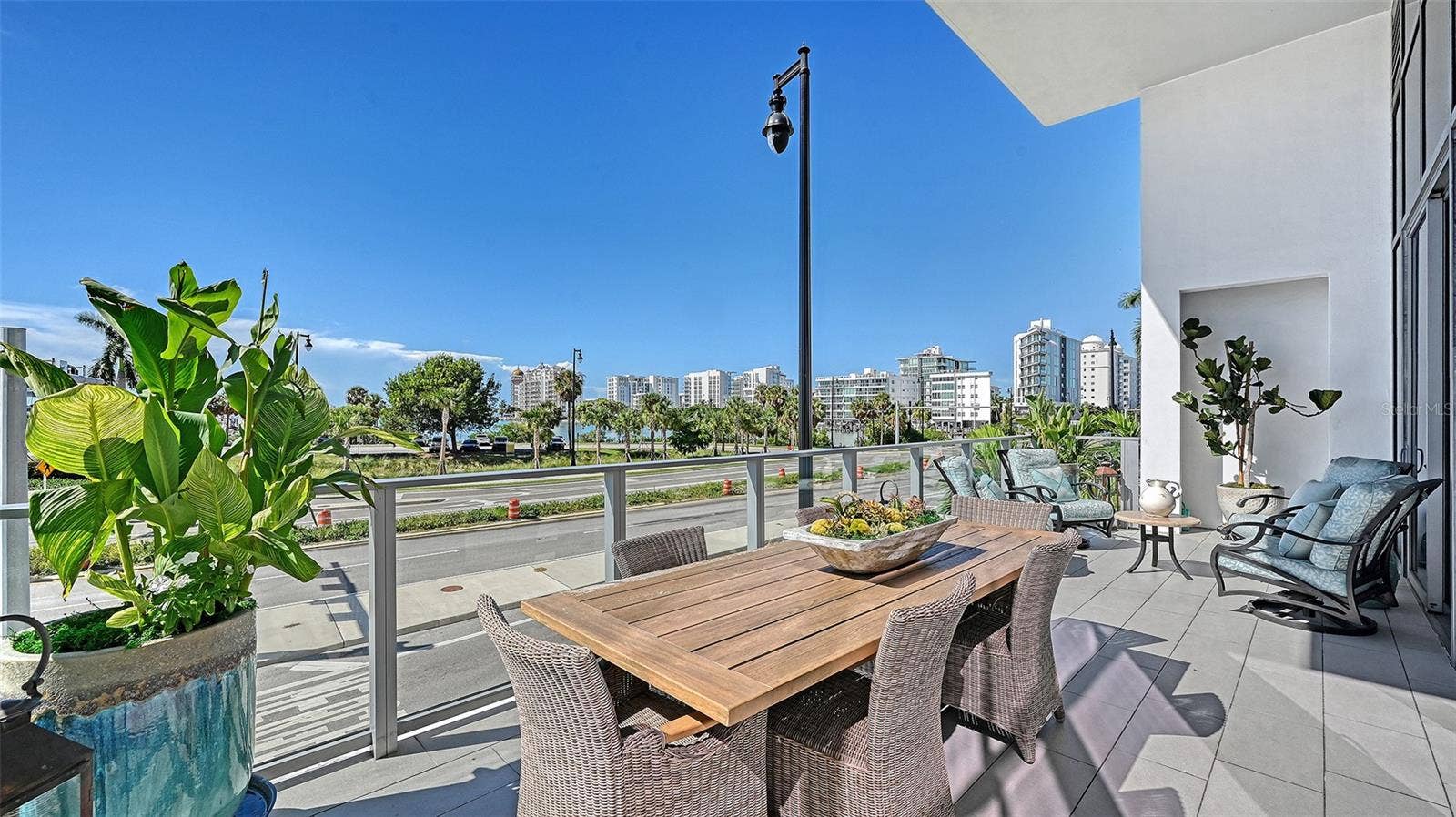 1155 N GULFSTREAM AVENUE, #207, Sarasota, FL 34236 Enjoy elegant outdoor entertaining on the expansive private terrace, perfect for al fresco dining while taking in the beautiful marina views and passing boats.