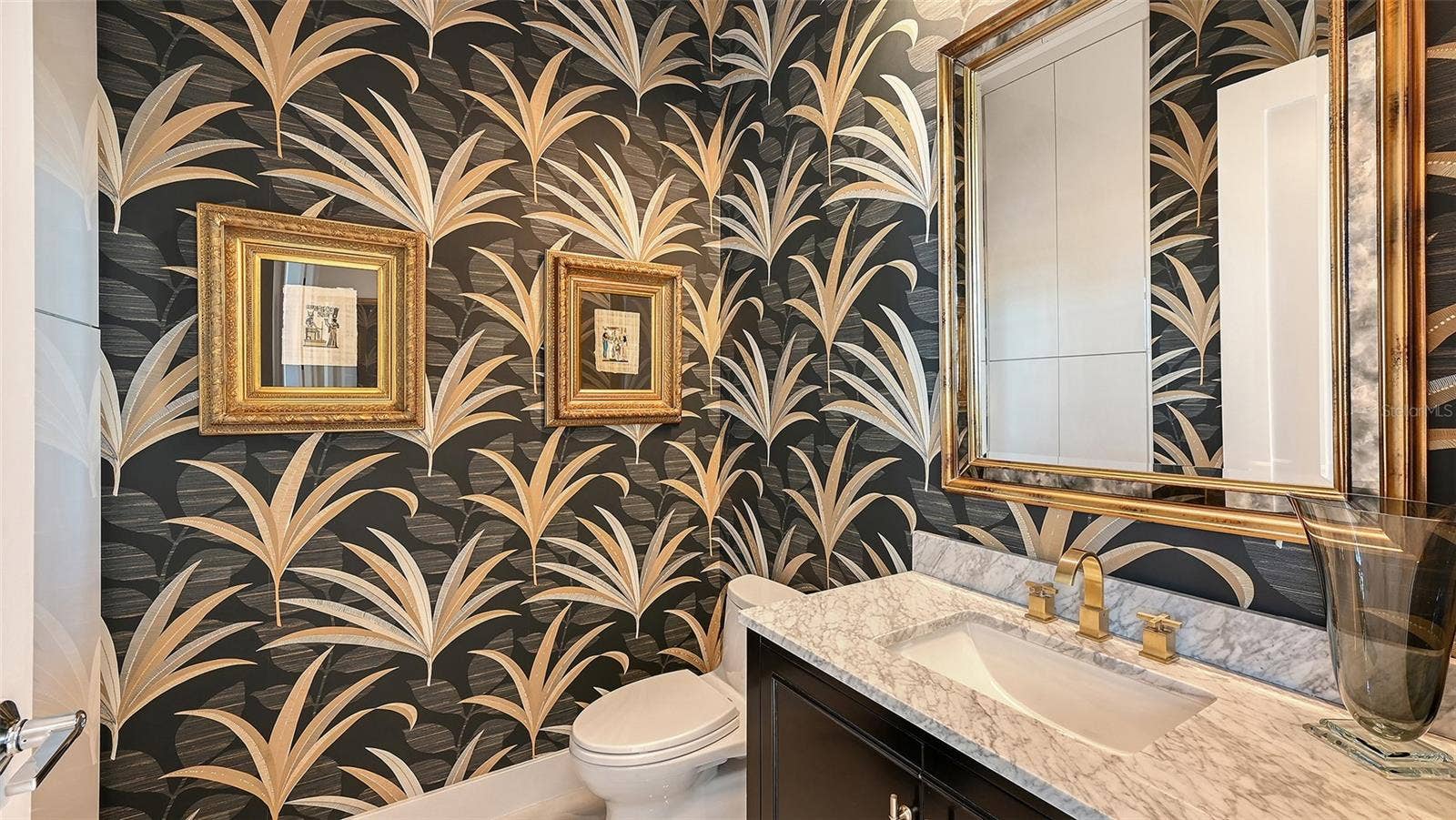1155 N GULFSTREAM AVENUE, #207, Sarasota, FL 34236 Elegant powder room adorned with exquisite designer wallpaper and refined finishes.