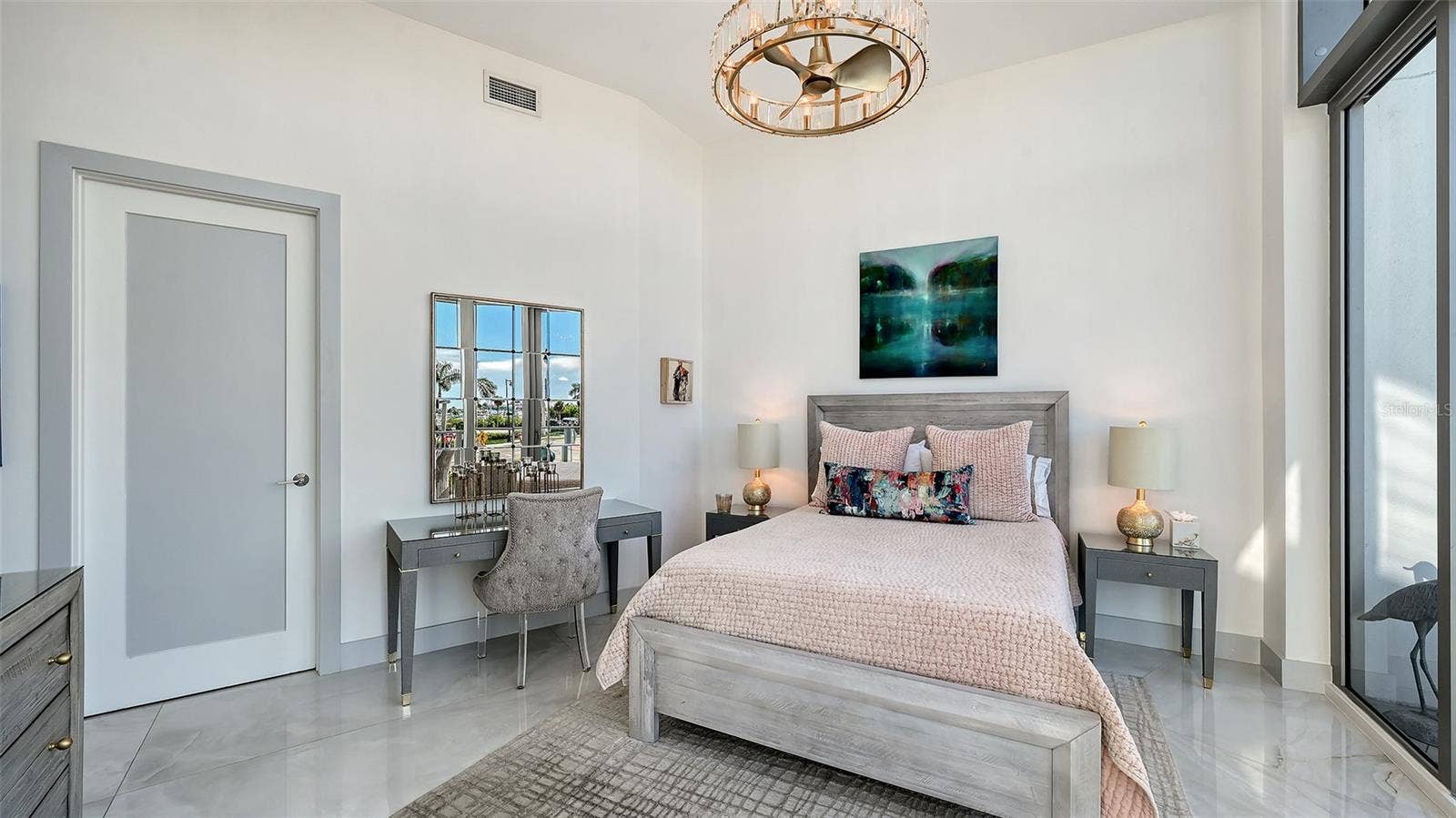 1155 N GULFSTREAM AVENUE, #207, Sarasota, FL 34236 The primary suite offers a spacious design inspiring relaxation and comfort.