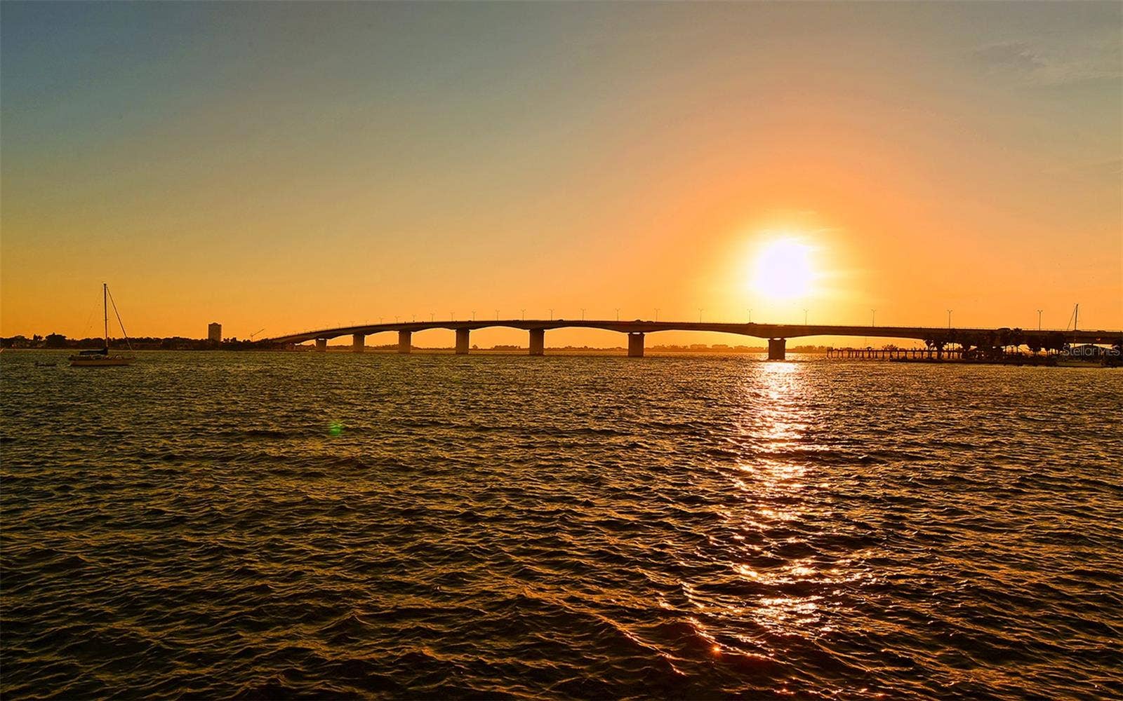 1155 N GULFSTREAM AVENUE, #207, Sarasota, FL 34236 Savor breathtaking Sarasota sunsets as the sky transforms into a stunning canvas of vibrant colors over the bay.