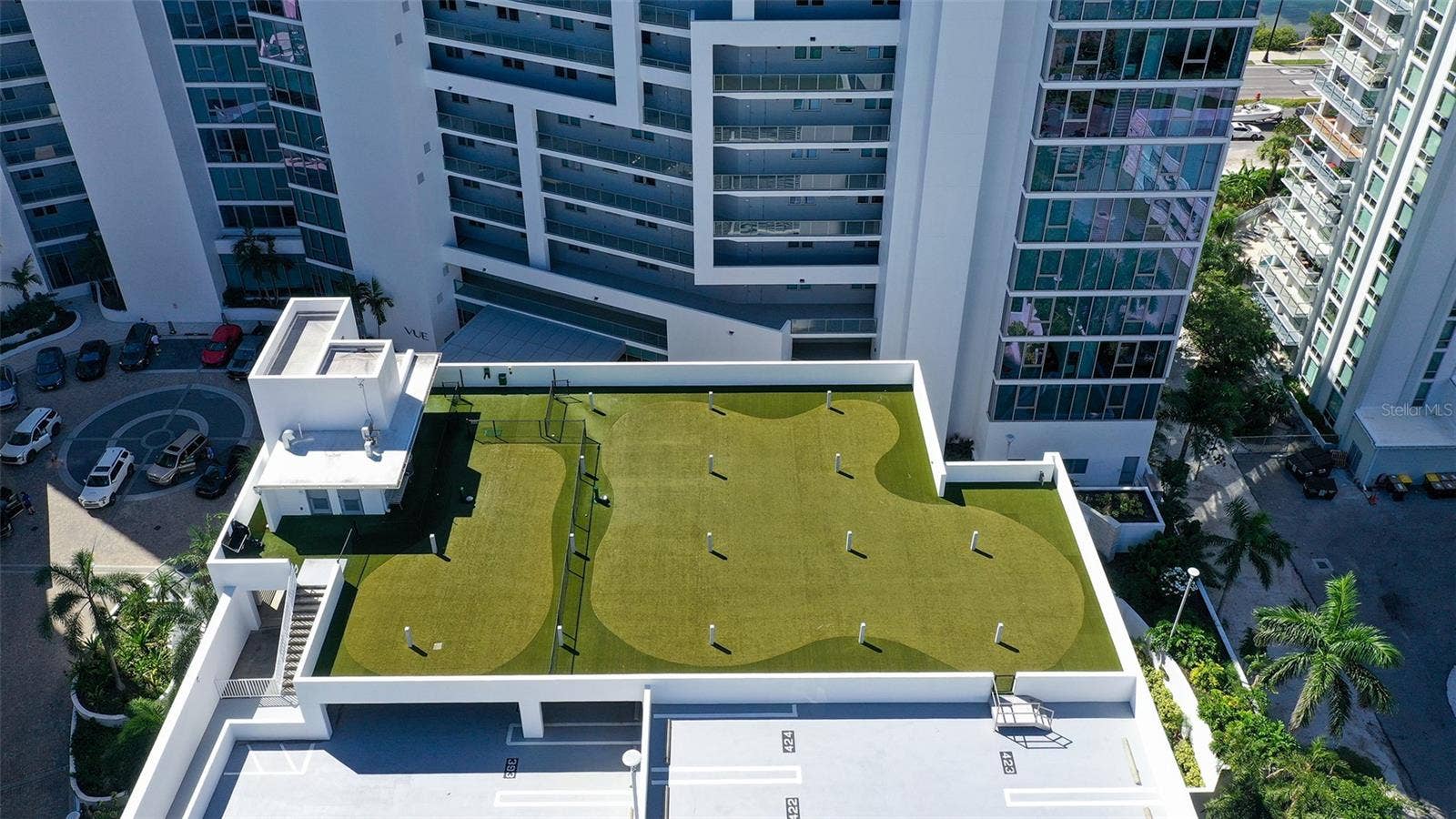 1155 N GULFSTREAM AVENUE, #207, Sarasota, FL 34236 An expansive rooftop dog park offering ample space for running and playing.