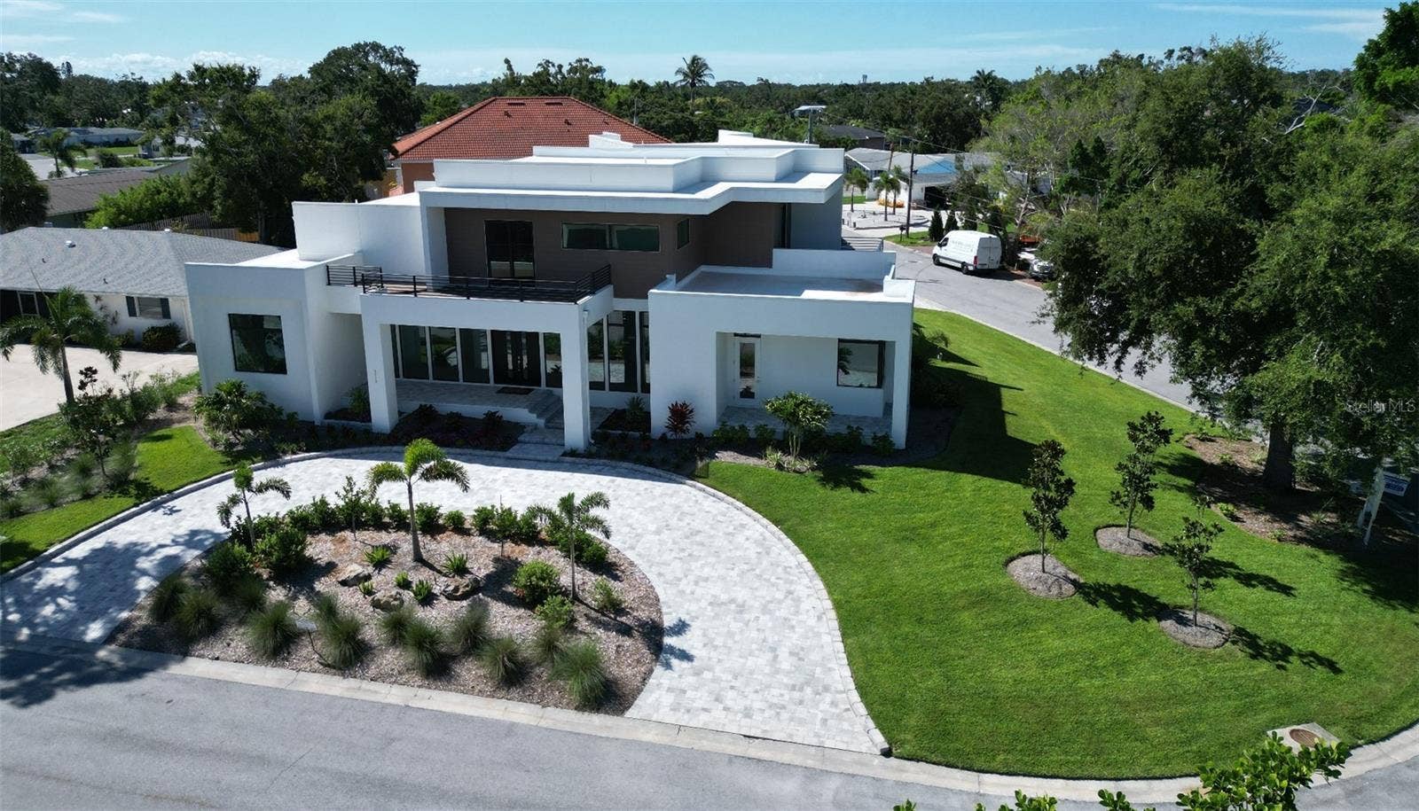 2110 MICHELE DRIVE, Sarasota, FL 34231 Approximately 1/3 acre lot. Circle drive in front, oversize 3 stall garage in rear.