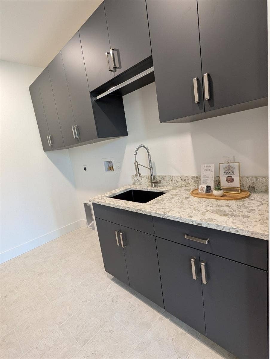 2110 MICHELE DRIVE, Sarasota, FL 34231 Custom cabinetry in main floor laundry
