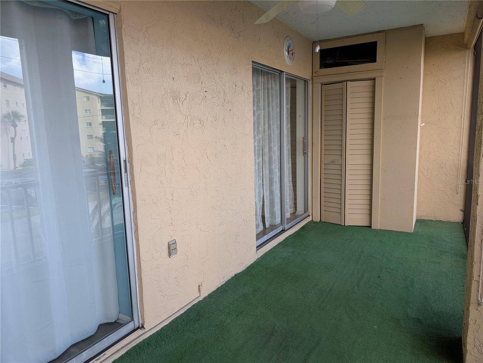 Sliding glass doors from both living & master bedrooms.