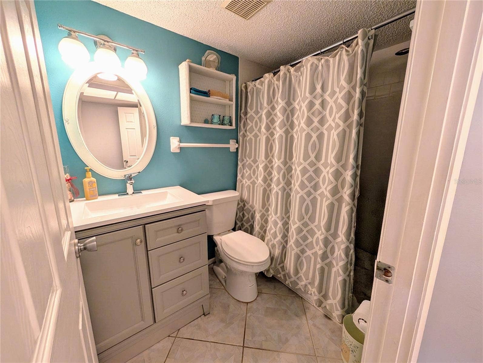 Master bath...note diagonal tile flooring & upgraded features