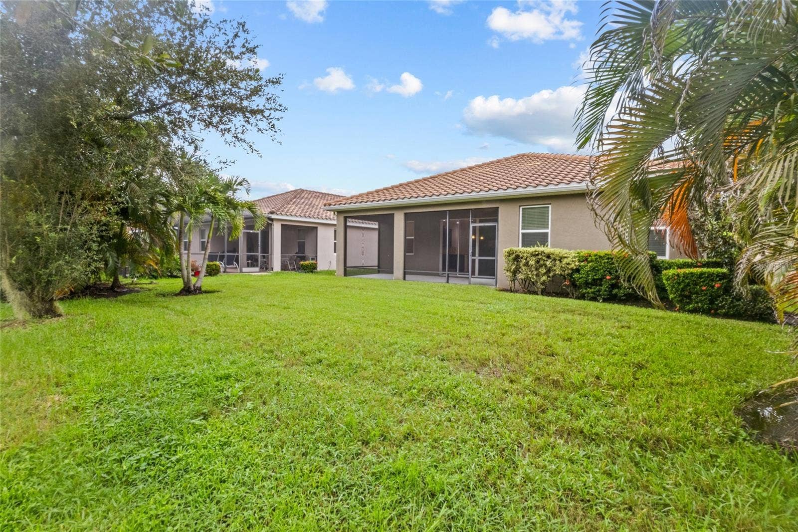 2924 ORIOLE DRIVE, Sarasota, FL 34243 This is the view looking back at the home. Lots of grass and room to run and play!