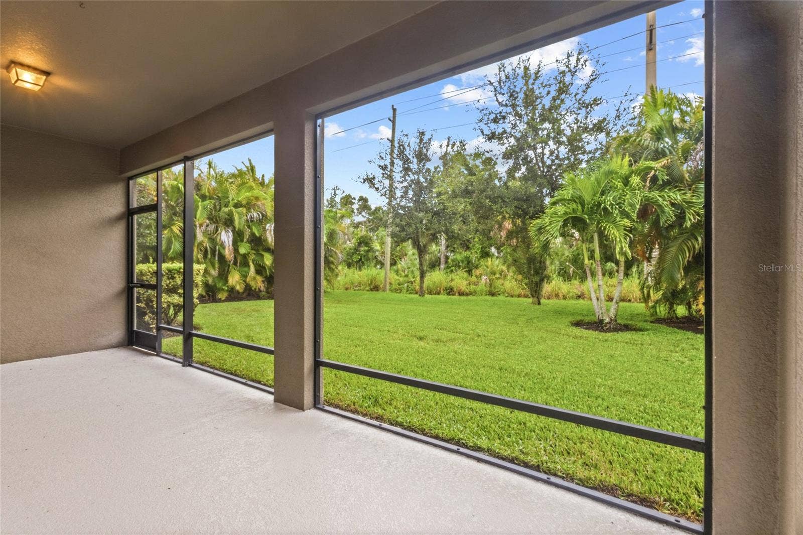 2924 ORIOLE DRIVE, Sarasota, FL 34243 Beautiful green view off the back screened in lanai