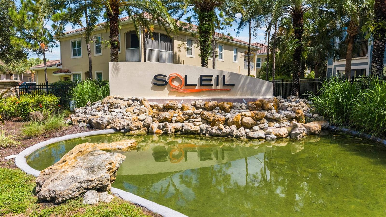 2924 ORIOLE DRIVE, Sarasota, FL 34243 Neighborhood entrance. The home in the more exclusive Soleil West enclave.