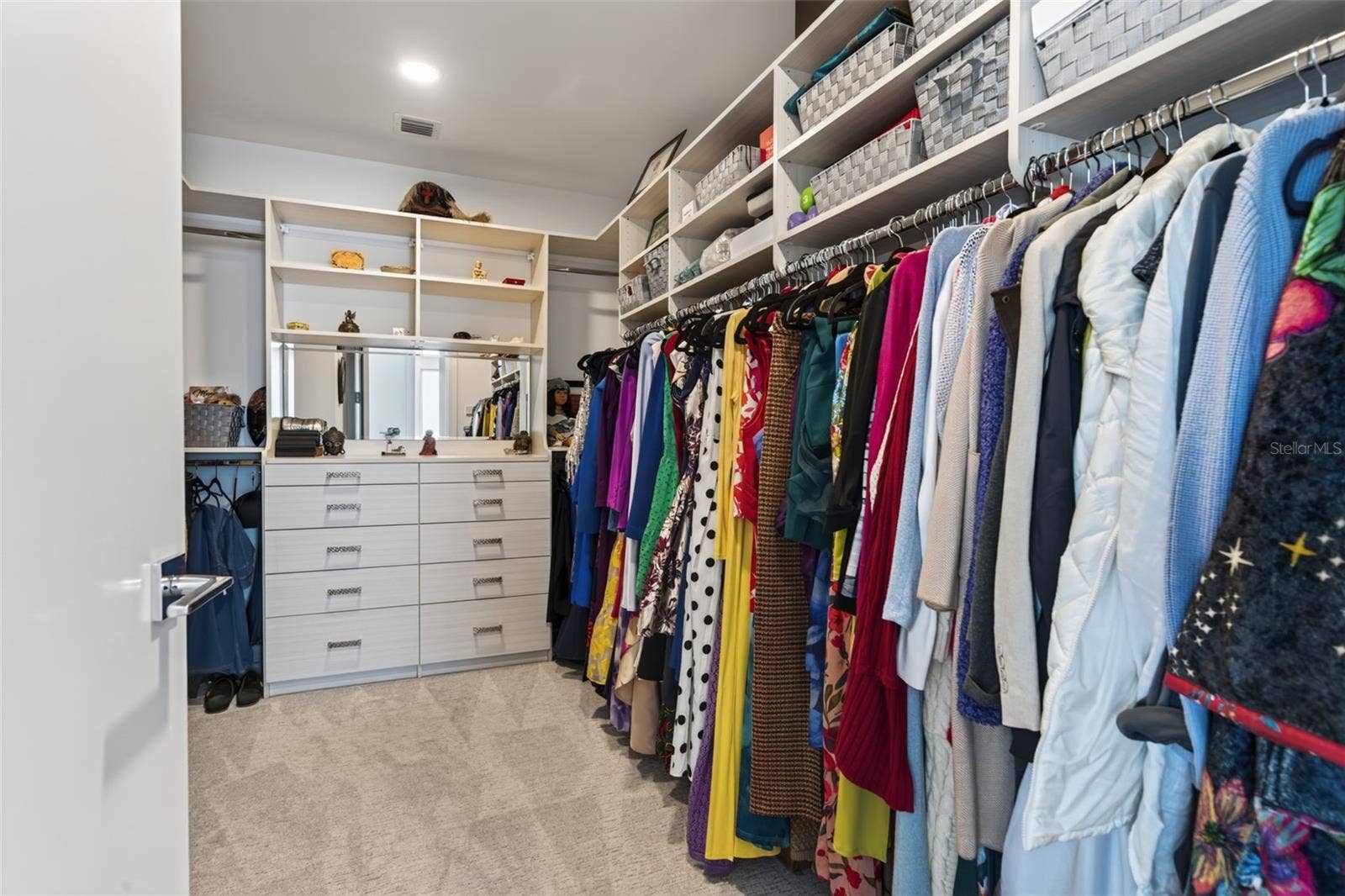 "Her" Walk- In Closet. Primary Ensuite