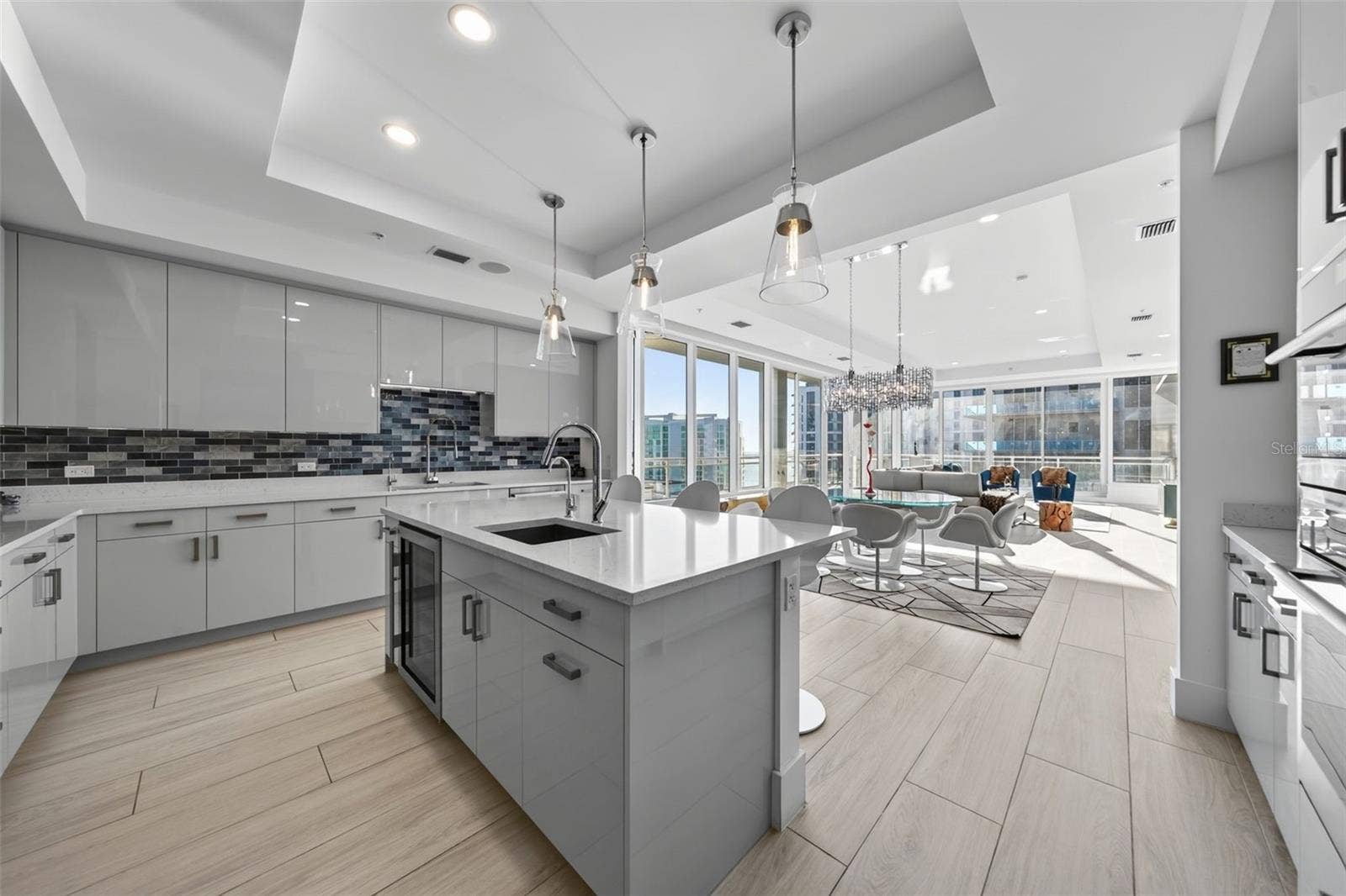 Kitchen with Island Featuring a Wine Refrigerator