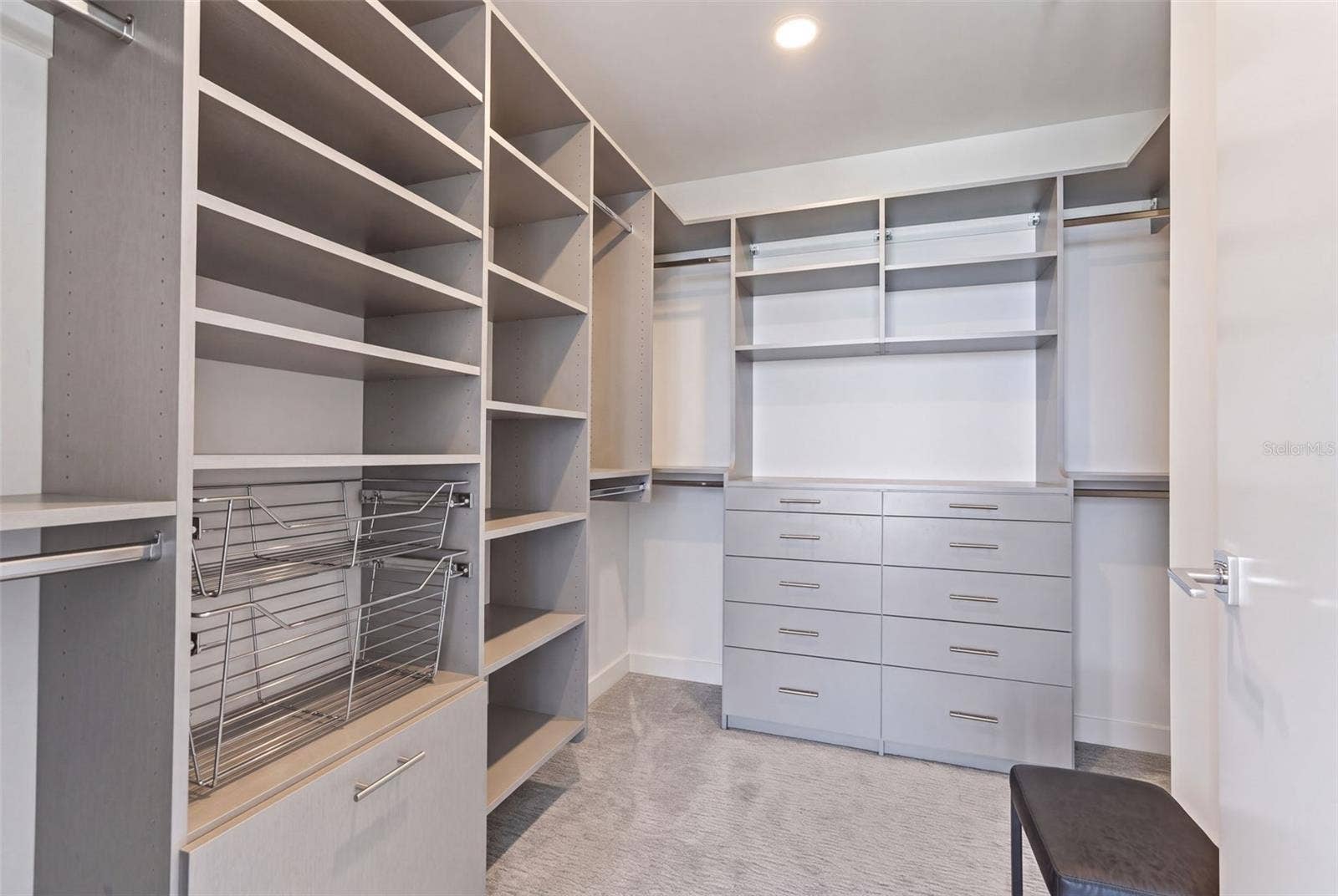 "His" Walk- In Closet. Primary Ensuite
