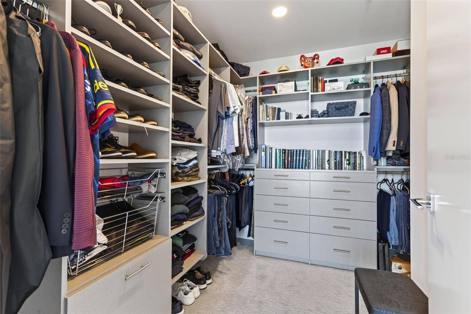 "His" Walk- In Closet. Primary Ensuite