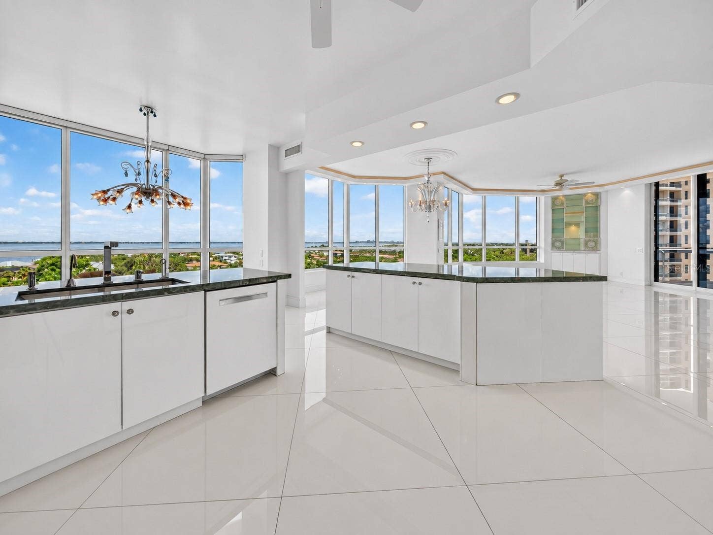 1281 GULF OF MEXICO DRIVE DRIVE, #707, Longboat Key, FL 34228 Open kitchen with breakfast nook and dining room view.