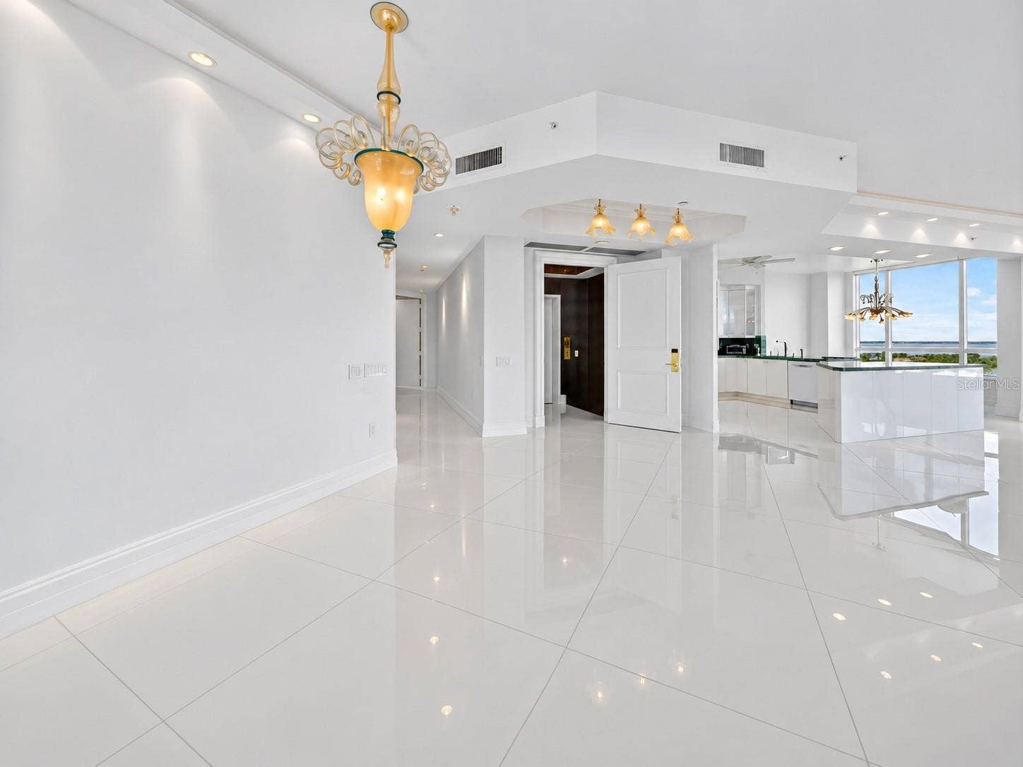 1281 GULF OF MEXICO DRIVE DRIVE, #707, Longboat Key, FL 34228 Den looking into living room and foyer