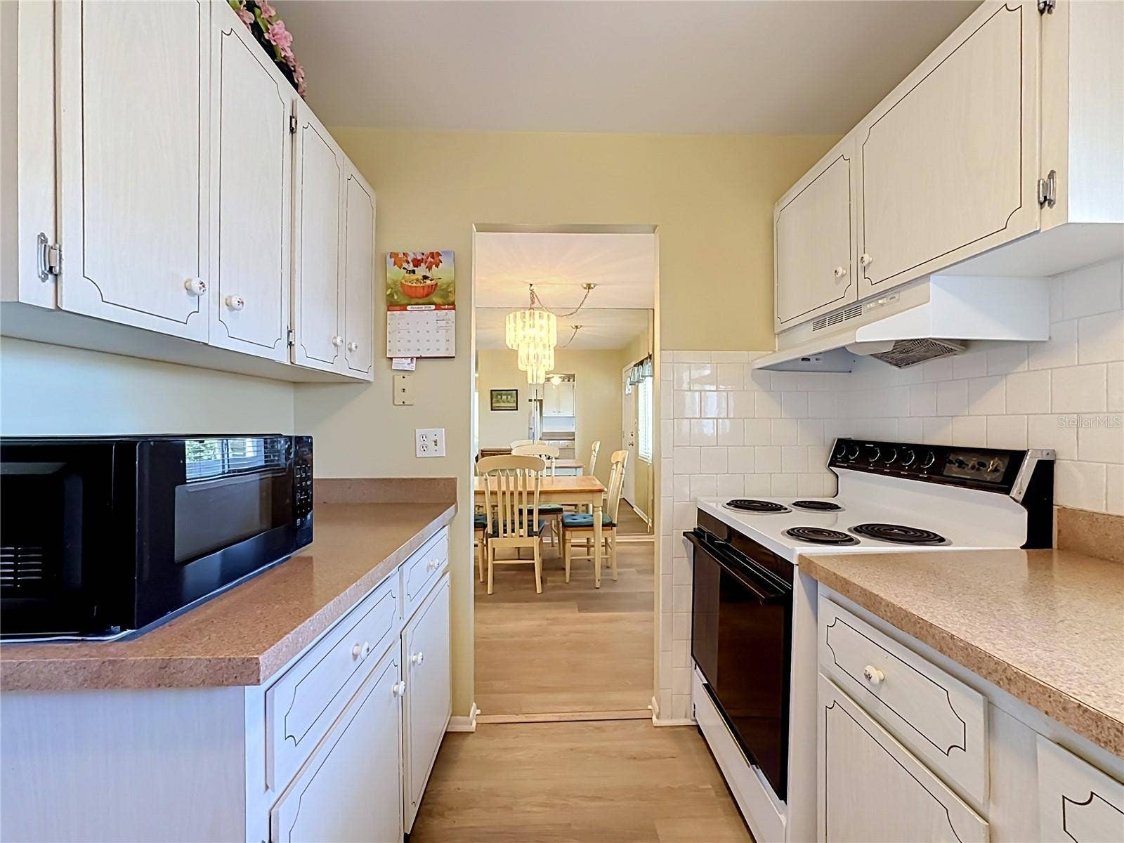 5898 17TH STREET W, #C31, Bradenton, FL 34207 Kitchen View Looking Toward Dinning Room