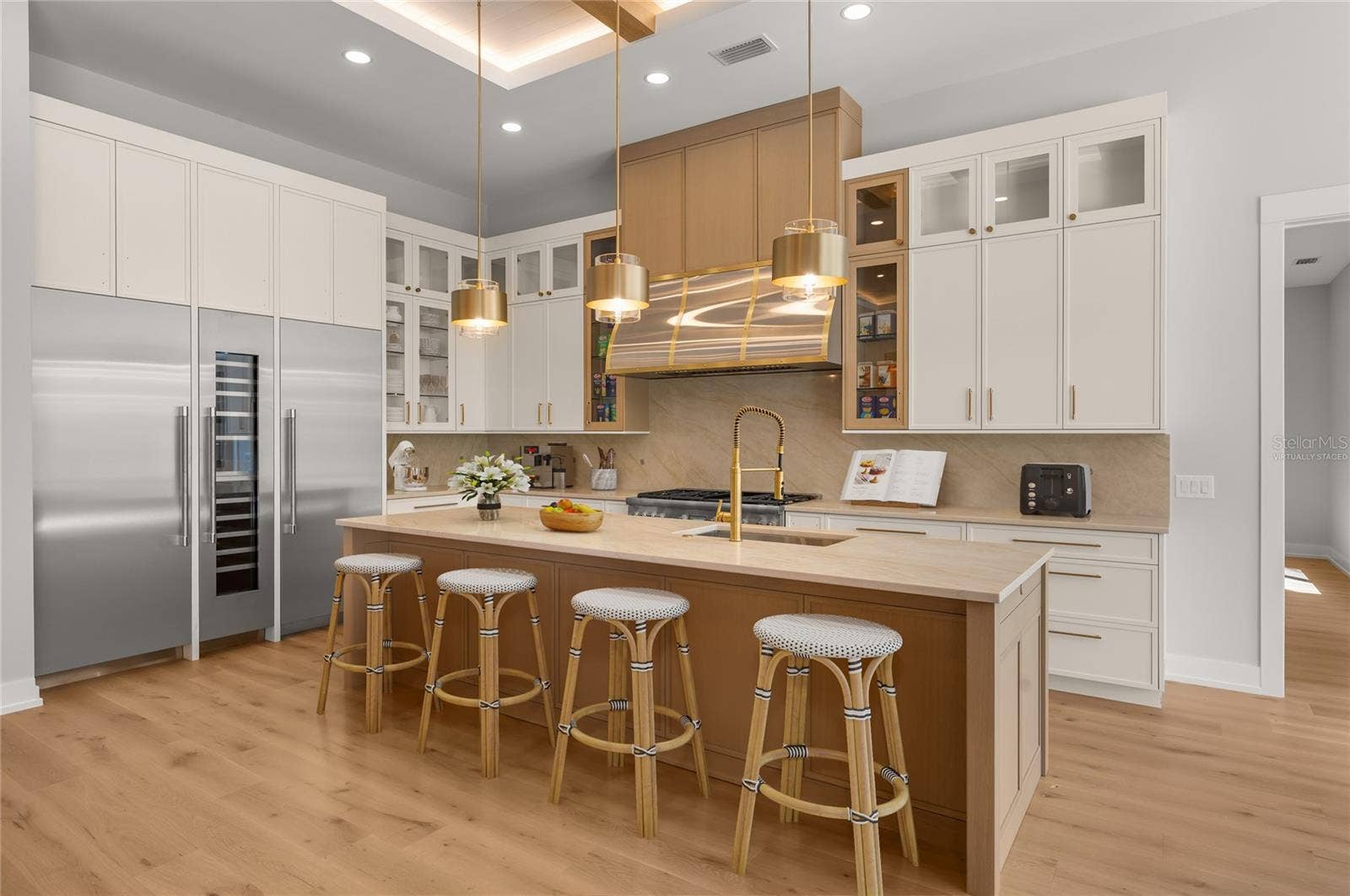 3360 BAYOU SOUND, Longboat Key, FL 34228 Virtually stagedno detail spared, with high-end appliances, custom cabinetry, and elevated finishes throughout.