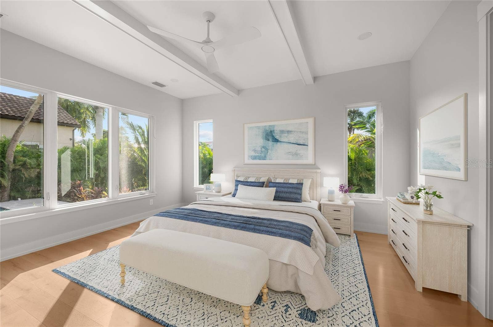 3360 BAYOU SOUND, Longboat Key, FL 34228 Virtually staged primary suite featuring elevated custom trim and refined architectural detailing.