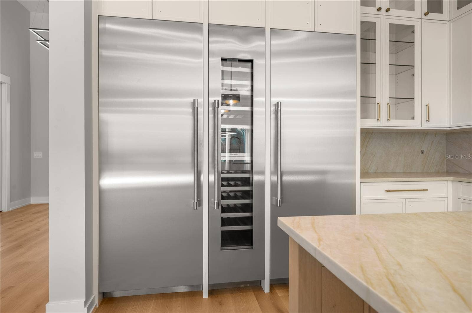 3360 BAYOU SOUND, Longboat Key, FL 34228 Refrigerator, wine fridge, and freezer.