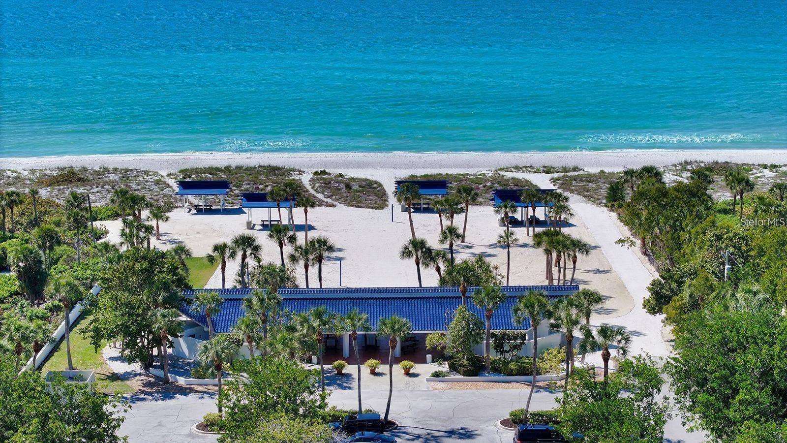 3360 BAYOU SOUND, Longboat Key, FL 34228 Bay Isles Beach Club is just a short drive away with picnic areas, grills, locker rooms, storage, cabanas, and world famous beach!!!