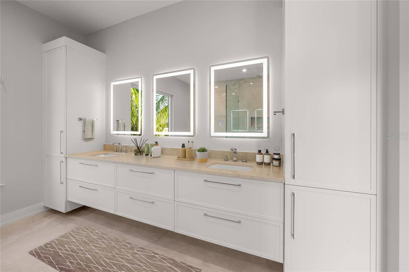 3360 BAYOU SOUND, Longboat Key, FL 34228 Virtually staged primary bath designed as a serene, spa-inspired retreat with luxurious finishes.