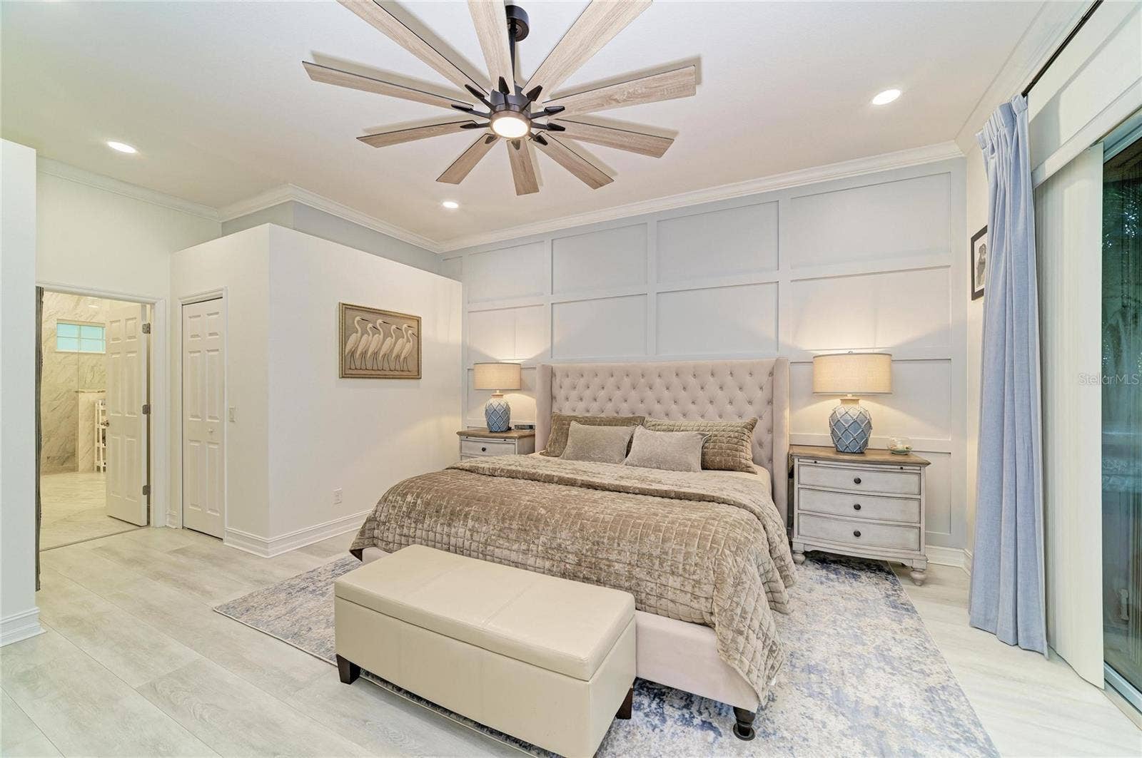 519 147TH COURT NE, Bradenton, FL 34212 Primary Bedroom with feature wall.