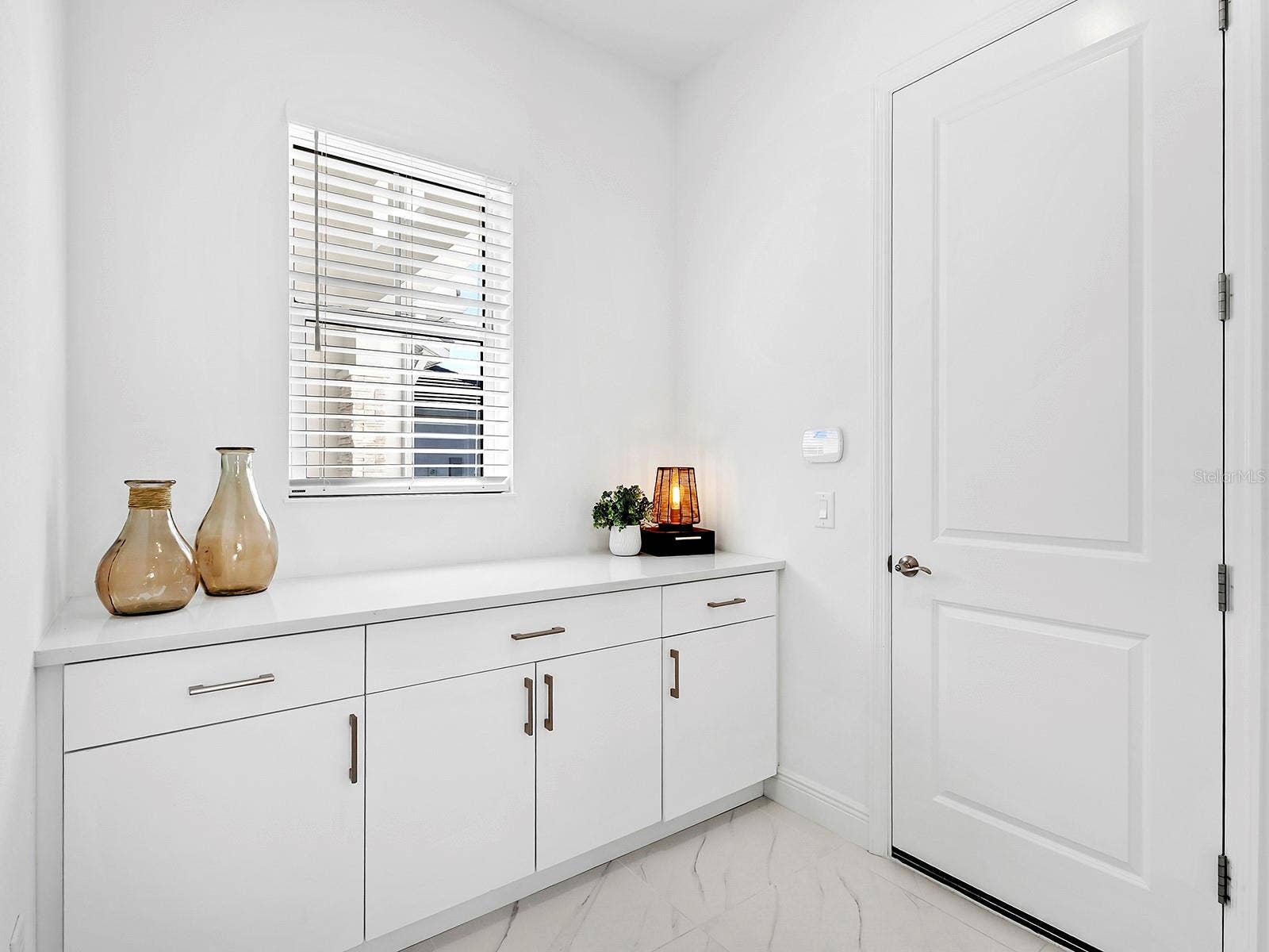 7959 WATERBEND TRAIL, Sarasota, FL 34240 Mudroom entry with custom built-ins