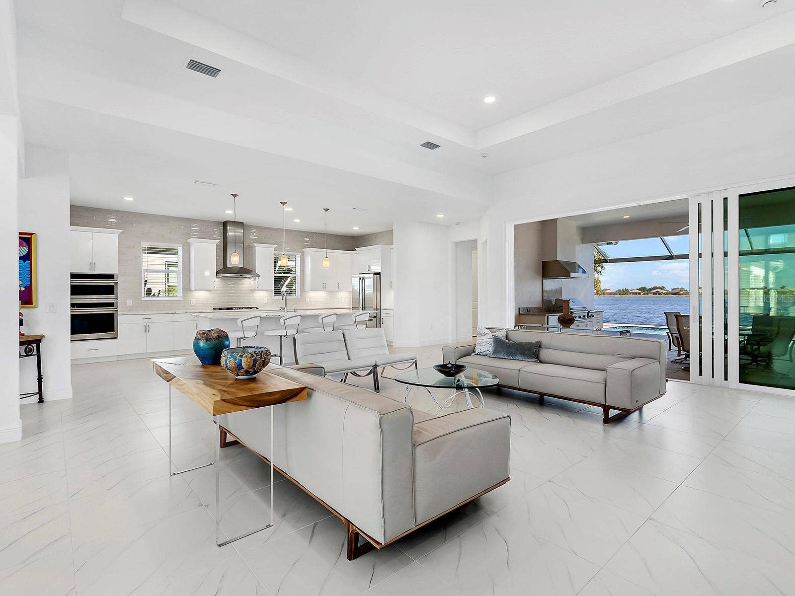 7959 WATERBEND TRAIL, Sarasota, FL 34240 9' impact sliding glass doors to the lanai