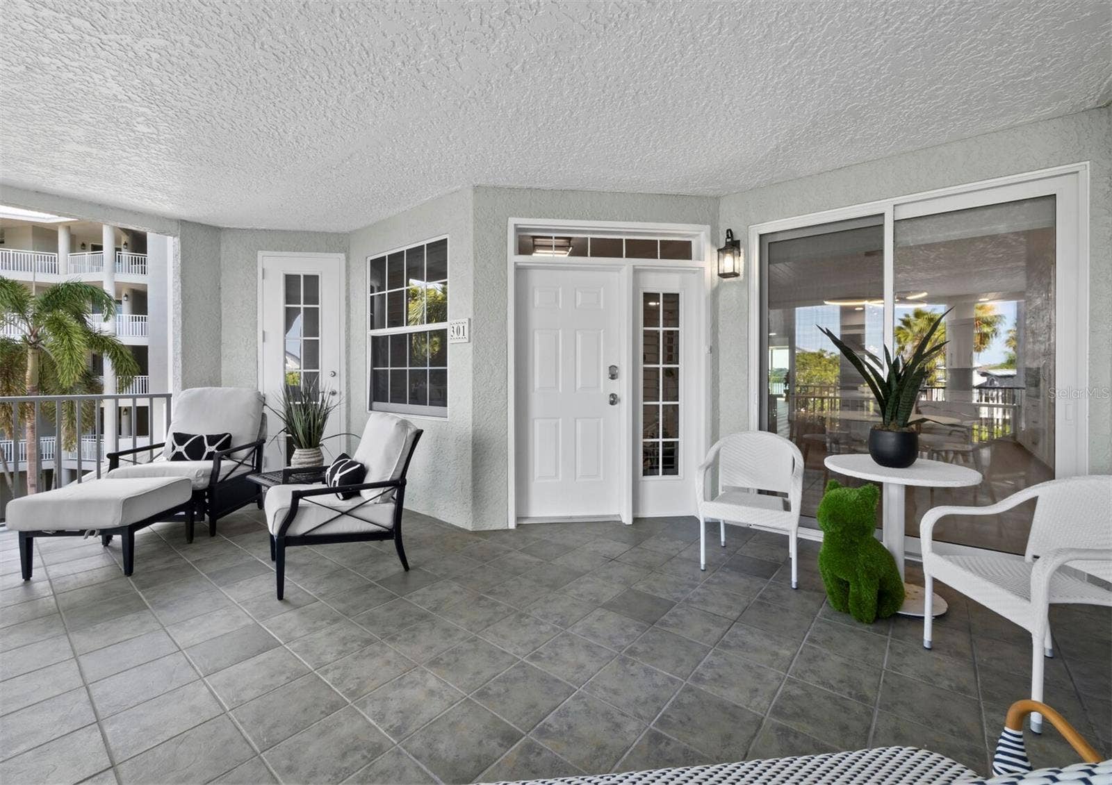 1260 DOLPHIN BAY WAY, #301, Sarasota, FL 34242 Front deck and entry