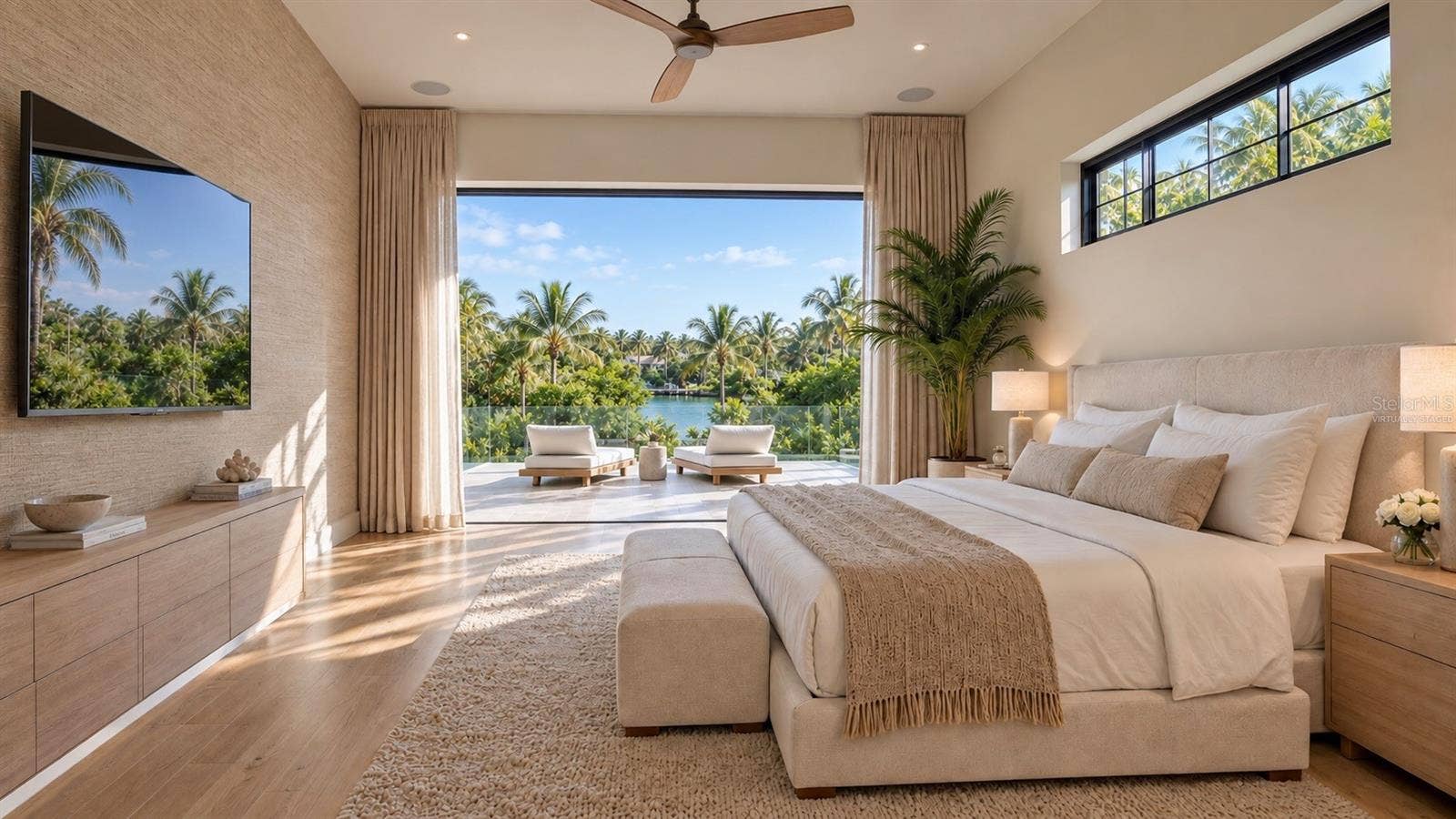 3441 GULFMEAD DRIVE, Sarasota, FL 34242 Primary bedroom, with canal view. Virtually staged.
