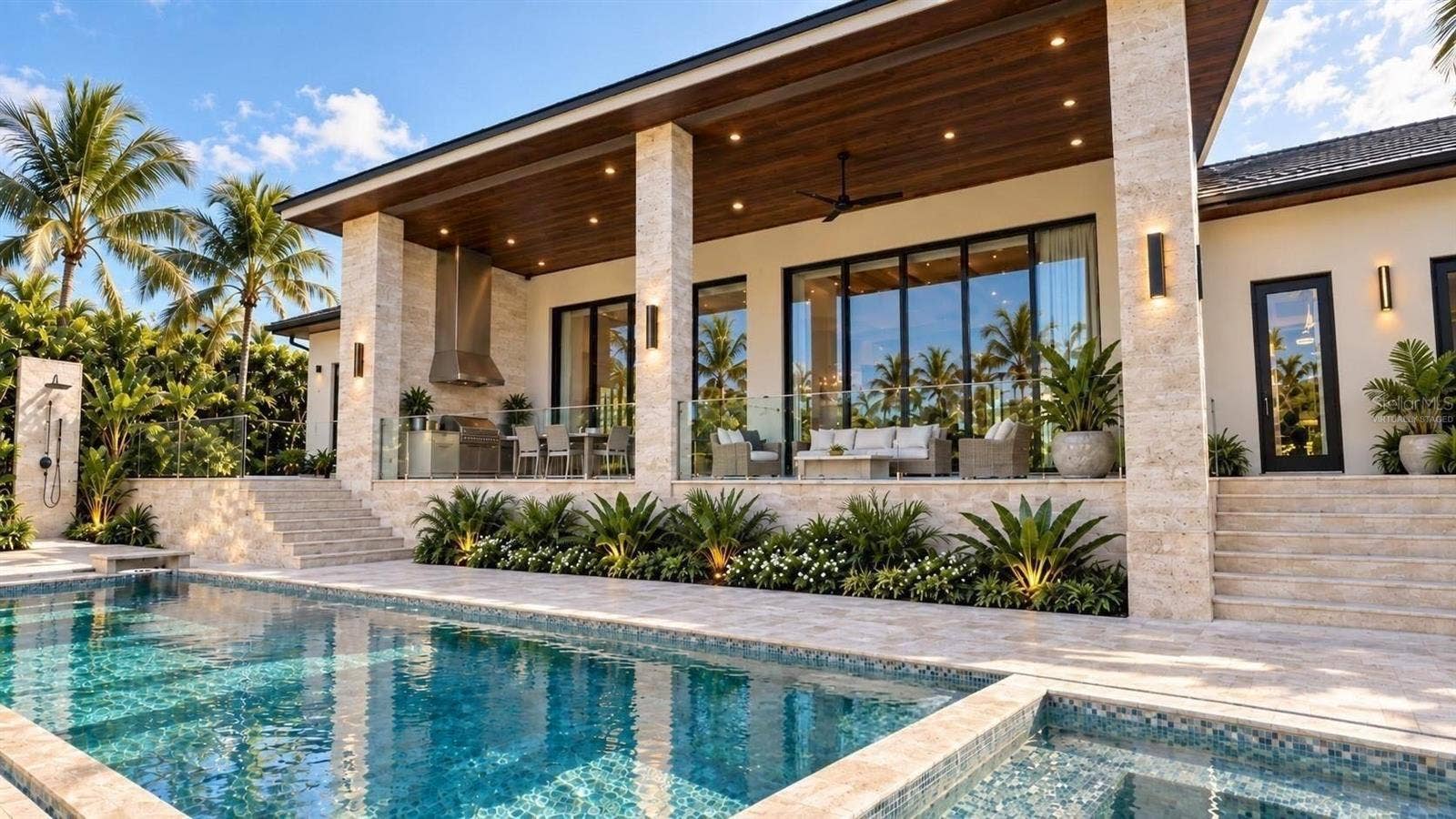 3441 GULFMEAD DRIVE, Sarasota, FL 34242 Patio with full outdoor kitchen, heated saltwater pool and hot tub spa. Virtually staged.