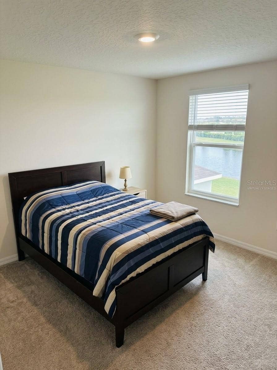 5058 GRANITE DUST PLACE, Palmetto, FL 34221 virtually staged bedroom