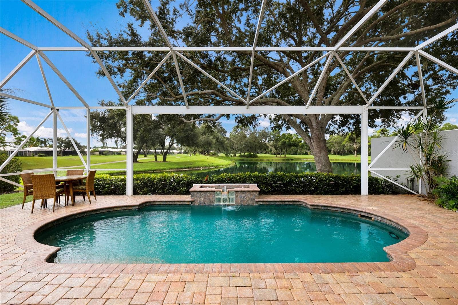 8728 52ND DRIVE E, Bradenton, FL 34211 With stunning water and golf course views!