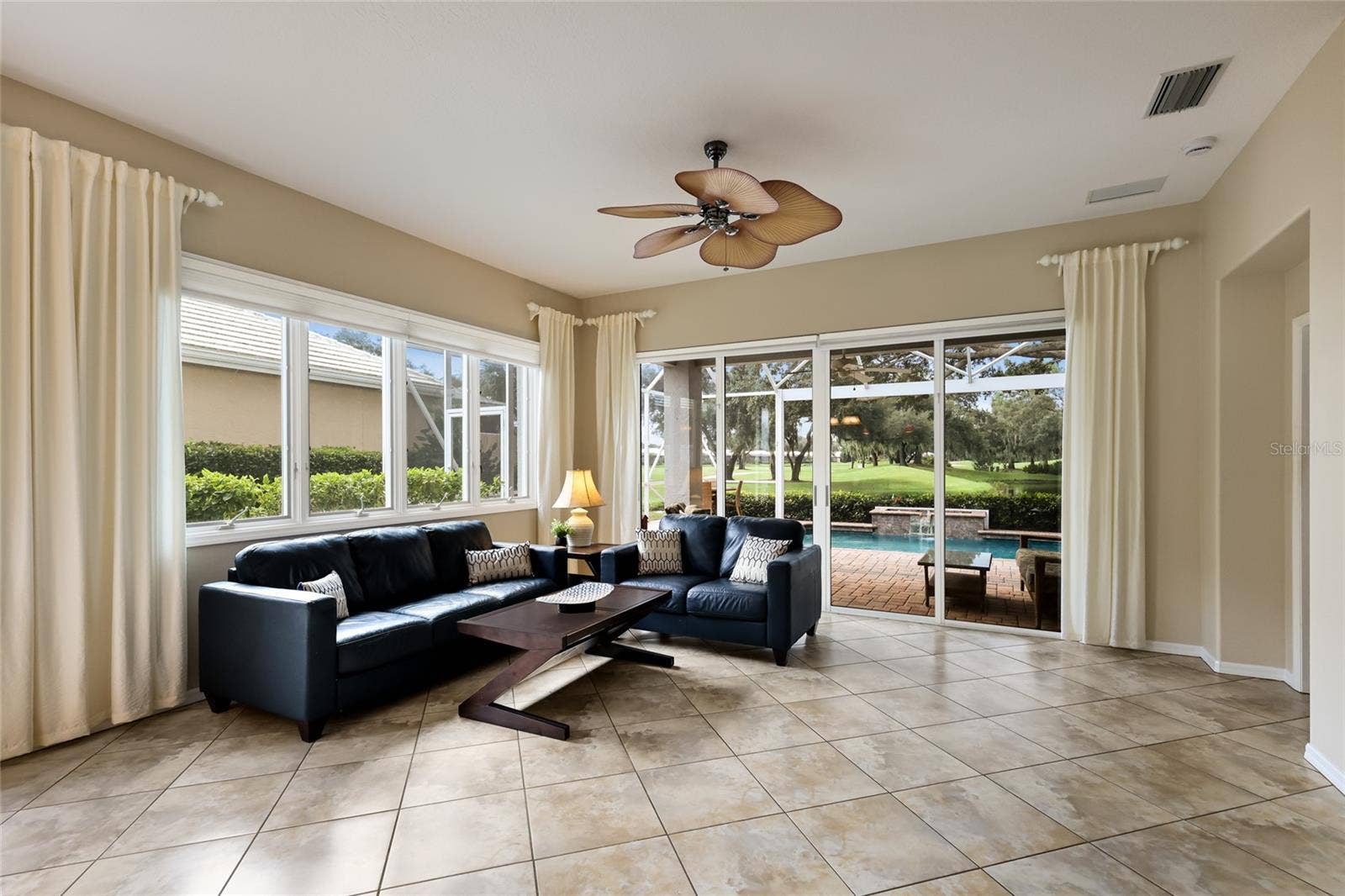 8728 52ND DRIVE E, Bradenton, FL 34211 Spacious living room with views of the course