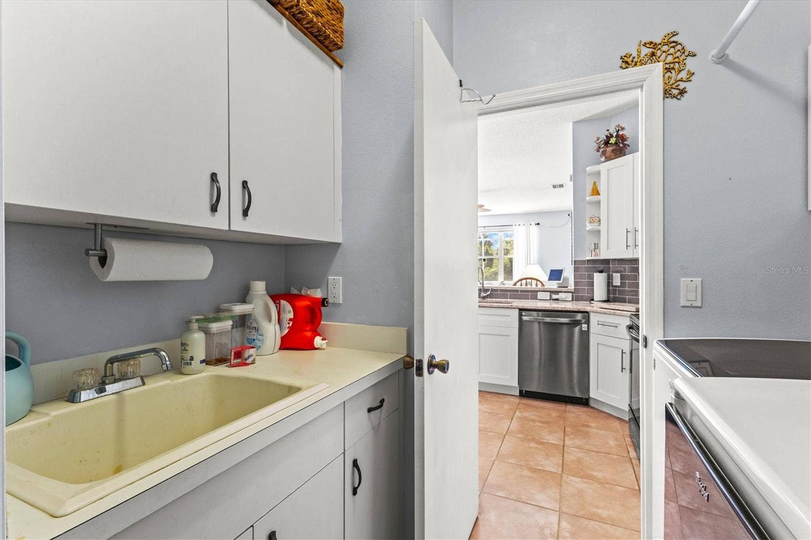 7107 91ST STREET E, Palmetto, FL 34221 Laundry area w/ sink and plenty of storage