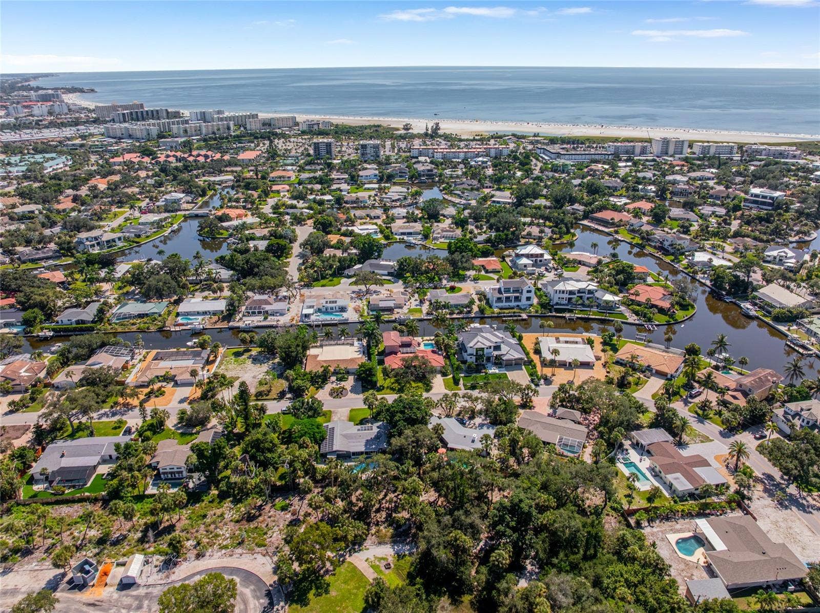 Aerial perspective showing how close the home is to Siesta Key Beach and the Gulf.
