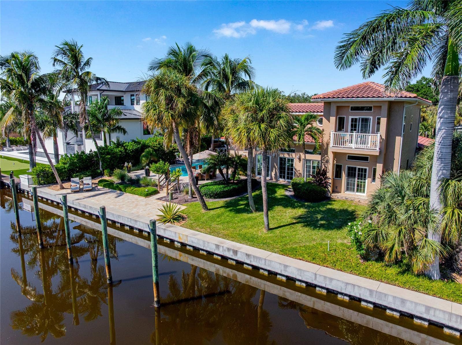 Rear Waterfront Aerial, providing a broader perspective of the property and its Siesta Key setting.