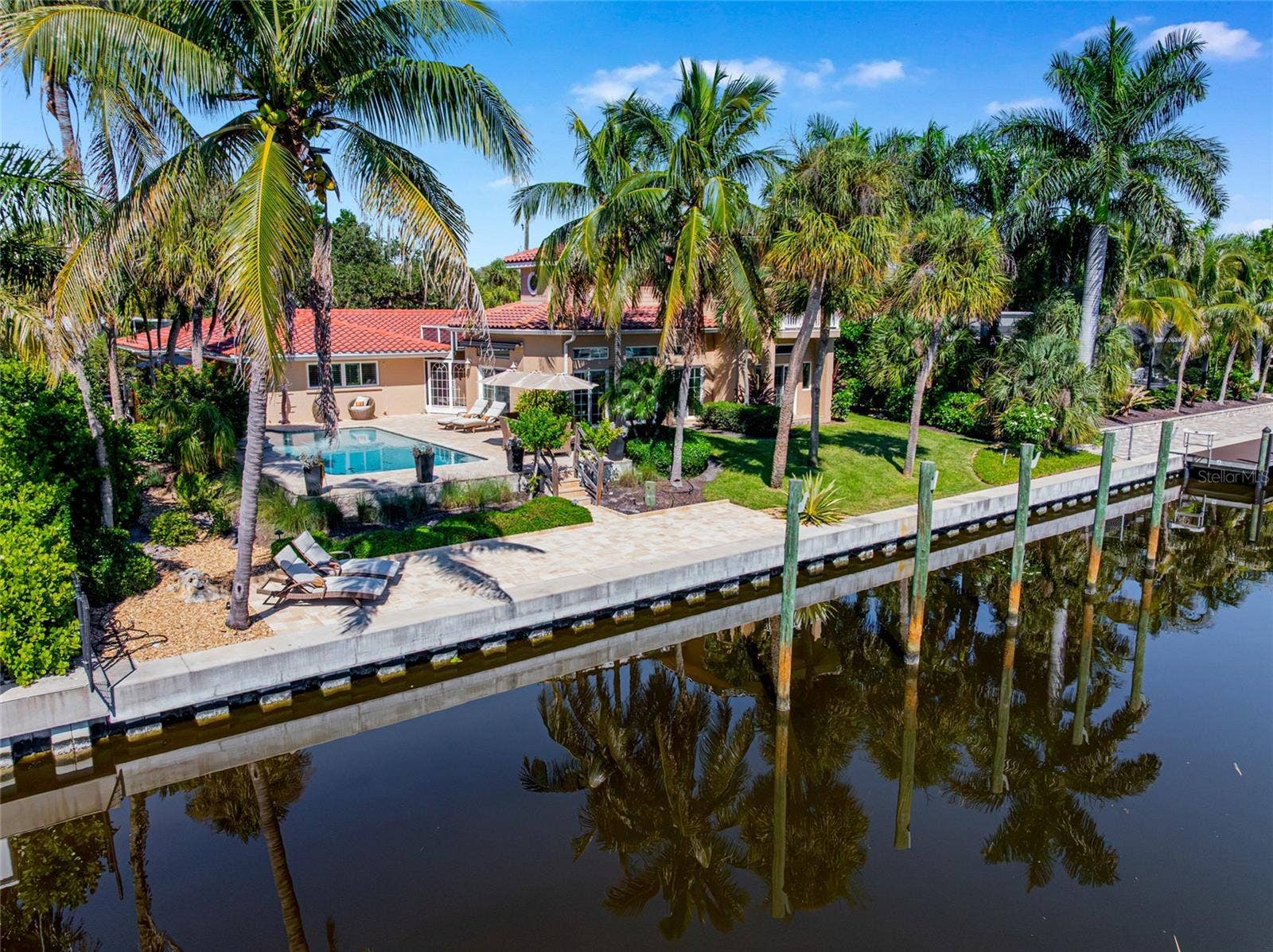 Canal Frontage Aerial, providing a broader perspective of the property and its Siesta Key setting.
