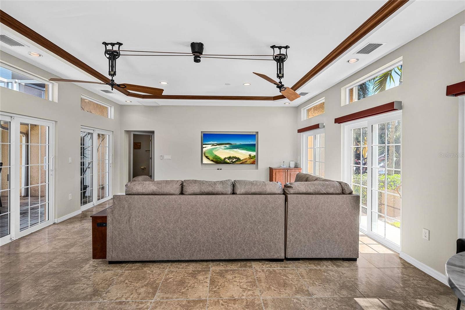 The approximately 424 square foot flex room offers generous space for media, games, fitness, lounging or other flexible uses.